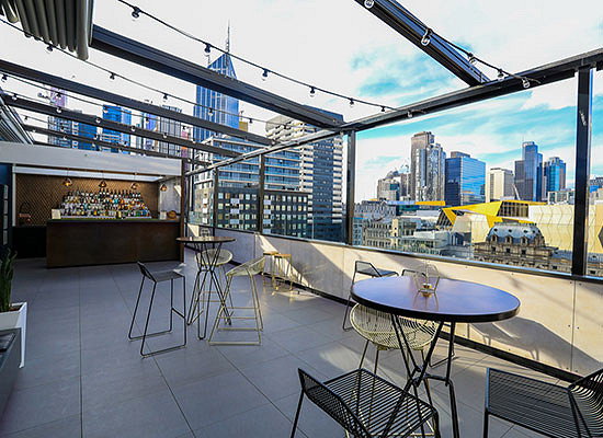 Rooftop bar goes ahead despite downstairs anger